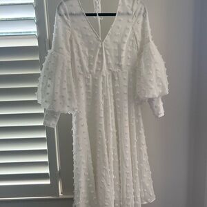 Elegant White Dress with Textured Design